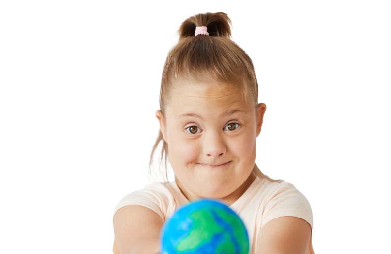 A young girl with Down syndrome holding a small globe, smiling with her hair in a ponytail.